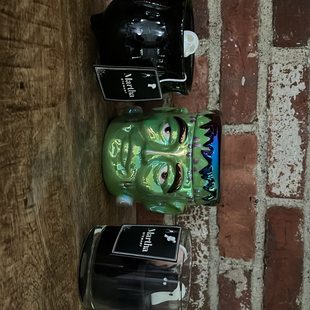 Martha Stewart collection candles, cauldron with skeleton ghostand Frankenstein